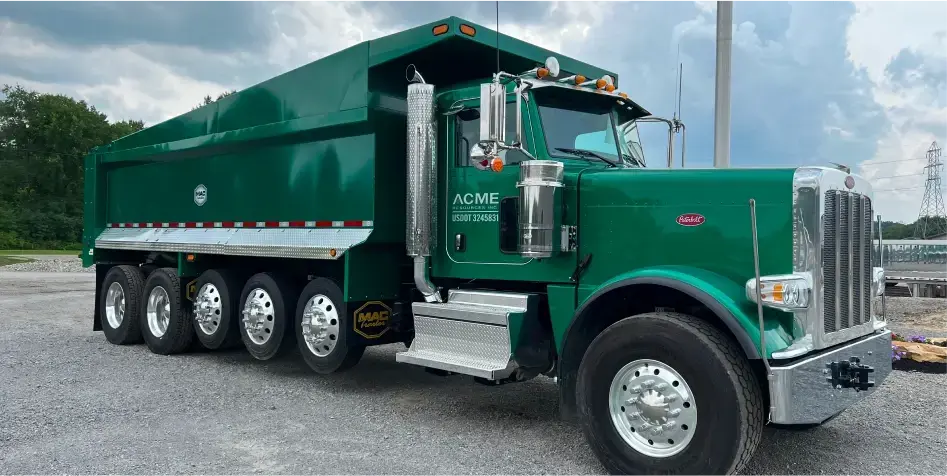 Green Steel Straight truck mounted to matching Peterbilt semitruck. 