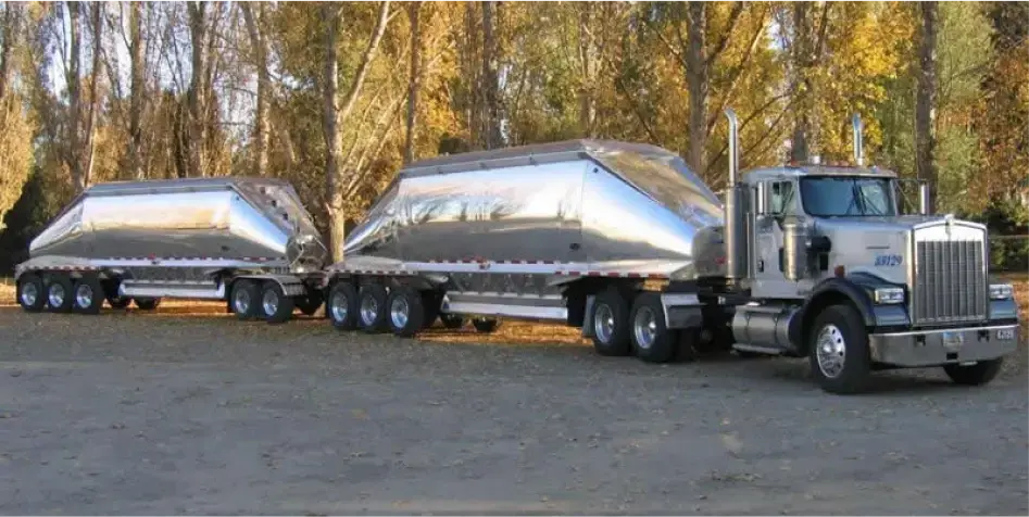 MAC Trailer Lead and Pup hitched to semitruck.