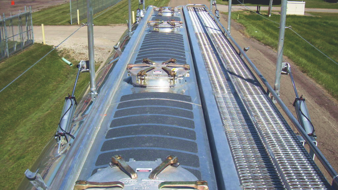 Ladder and catwalk for pneumatic lead and pup tank